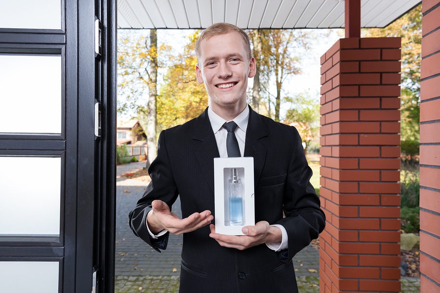 Door to door salesman selling perfume